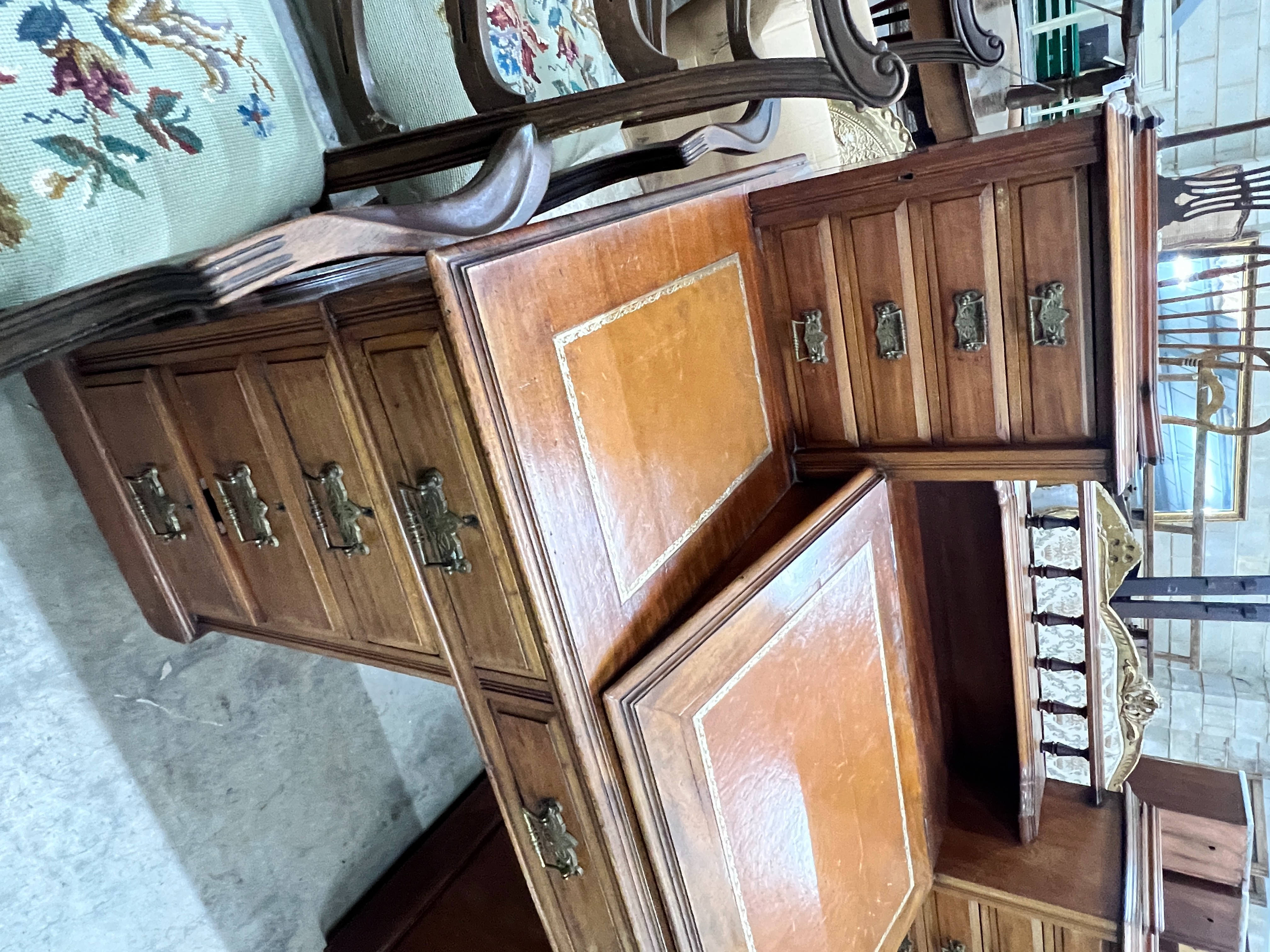 A late Victorian mahogany pedestal desk with hinged slant front, width 137cm, depth 73cm, height 113cm